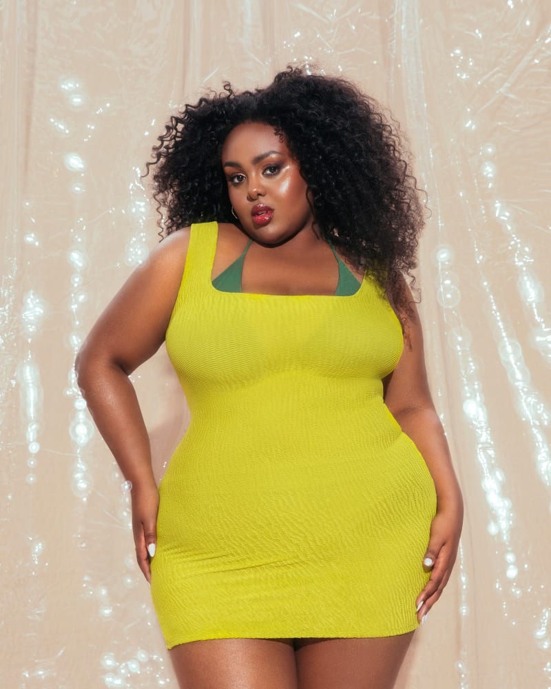 Front of a model wearing a size 3X-4X Neon Swim Dress in Green by Hilary MacMillan. | dia_product_style_image_id:293272